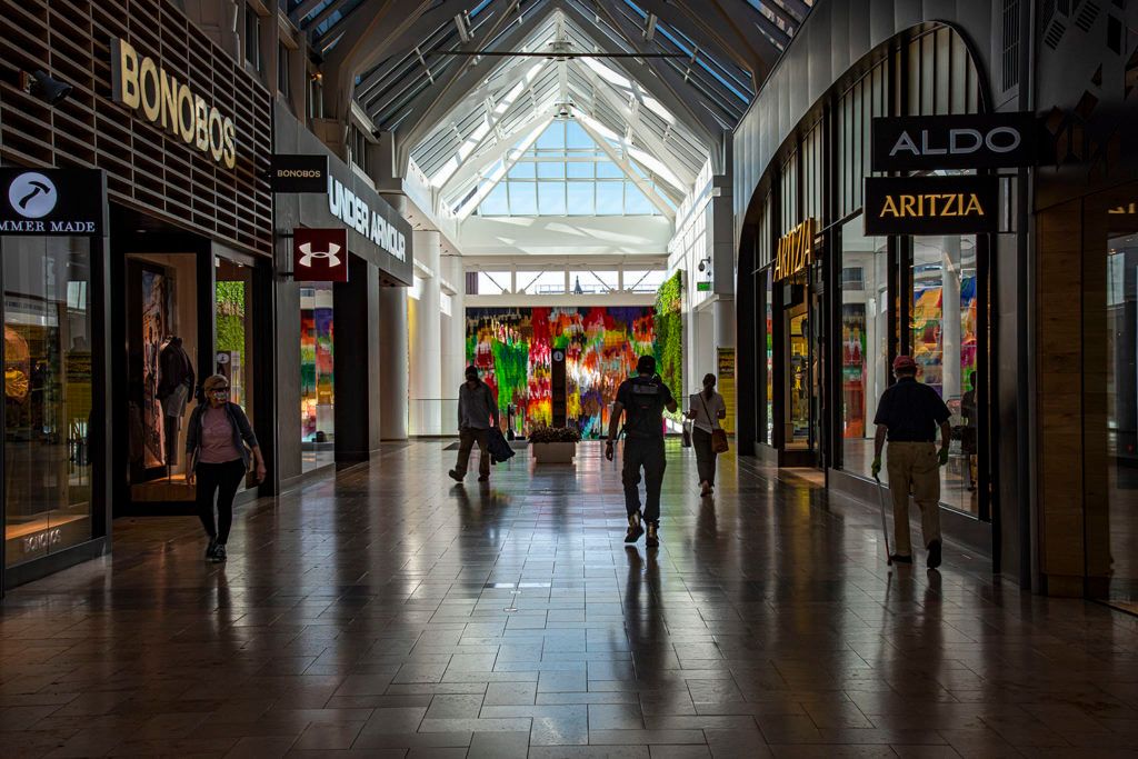 Prudential Shopping Center Horizontal color photograph of people walking in the closed Prudential Shopping Center in Copley Square, Boston, MA.